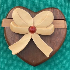 Heart Shaped Ring puzzle Box. Beautiful bow detail on the top of the box.